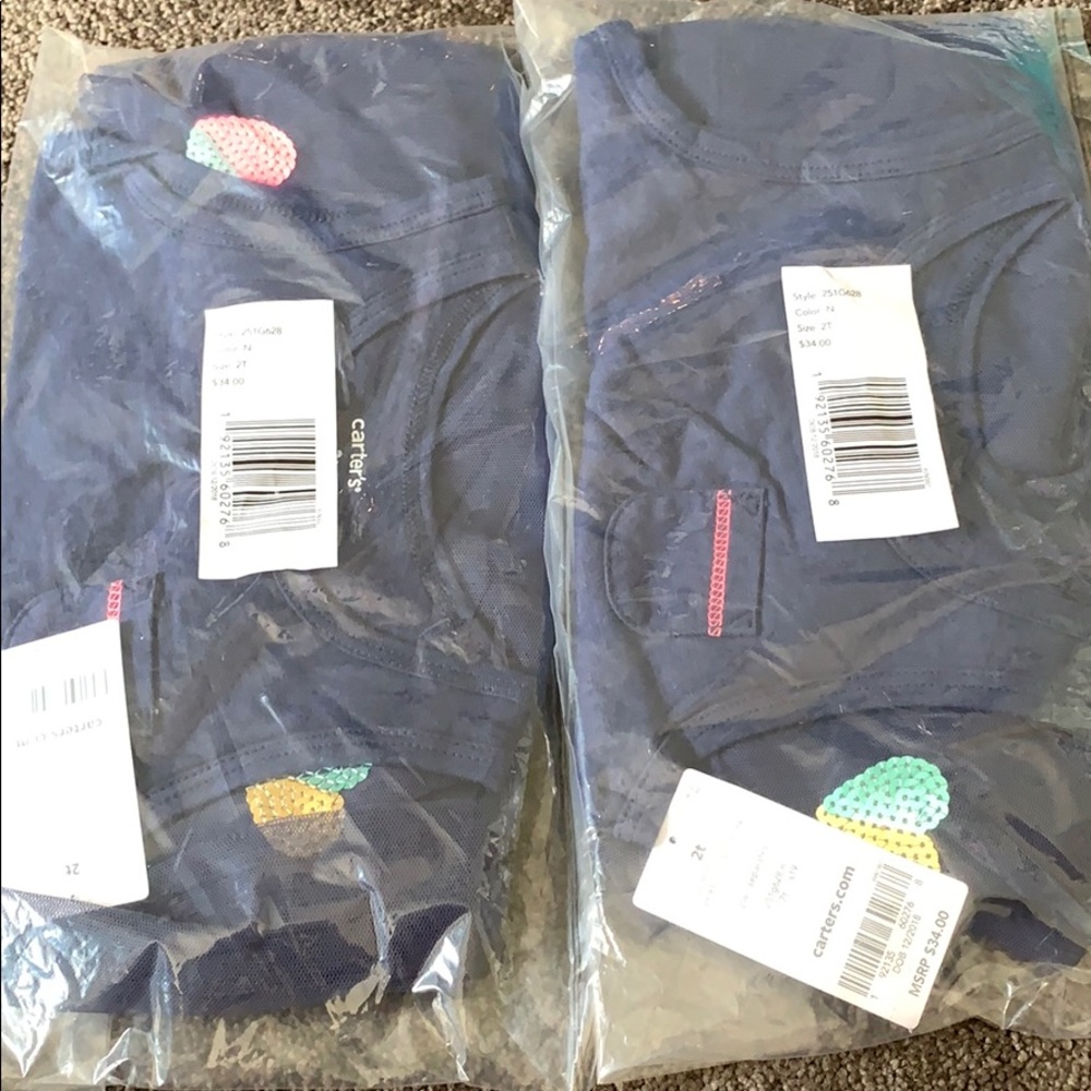 2T Carter’s dress 29-31 lbs